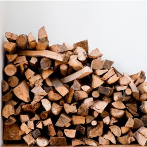 a large pile of chopped wood against a white background